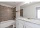 Well-appointed bathroom with granite counters, tile flooring, and modern fixtures at 2989 Chene Pl, Duluth, GA 30097