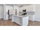 Spacious kitchen featuring granite countertops, stainless steel appliances, and plenty of storage at 2989 Chene Pl, Duluth, GA 30097