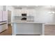 Large kitchen island with granite countertop, sink, and ample workspace at 2989 Chene Pl, Duluth, GA 30097