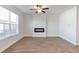 Cozy living room with a modern fireplace and large windows at 2989 Chene Pl, Duluth, GA 30097
