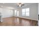 Open-concept living area with hardwood floors and ample natural light at 2989 Chene Pl, Duluth, GA 30097