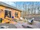 Beautiful brick patio with ample seating offering an outdoor relaxation space at 4001 Pool Rd, Winston, GA 30187