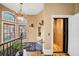 Staircase features custom millwork, hardwood floors and an elevator to the upper floors at 4001 Pool Rd, Winston, GA 30187