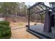 Backyard deck featuring a pergola with string lights and outdoor space at 2971 Montview Sw Dr, Marietta, GA 30060