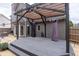 Backyard deck featuring a pergola with string lights and outdoor space at 2971 Montview Sw Dr, Marietta, GA 30060