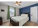 Comfortable bedroom with a window, bedside table, and ample natural light at 2971 Montview Sw Dr, Marietta, GA 30060