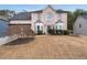 Beautiful exterior view of home featuring a manicured lawn and brick facade at 2971 Montview Sw Dr, Marietta, GA 30060