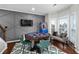 Entertainment room featuring a custom accent wall, poker table, and natural light at 2971 Montview Sw Dr, Marietta, GA 30060