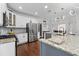 Modern kitchen with stainless steel appliances, granite countertops, and ample cabinet space at 2971 Montview Sw Dr, Marietta, GA 30060