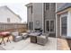 Outdoor patio with wicker furniture, a grill, and a fenced in yard, great for entertaining at 2971 Montview Sw Dr, Marietta, GA 30060
