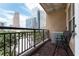 Private balcony overlooking the city skyline with comfortable seating at 1101 Juniper Ne St # 721, Atlanta, GA 30309