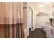 Clean bathroom featuring shower-tub combo and decorative shower curtain at 1101 Juniper Ne St # 721, Atlanta, GA 30309