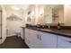 Well-lit bathroom with double vanity, granite countertops, and modern fixtures at 1101 Juniper Ne St # 721, Atlanta, GA 30309