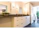 Modern bathroom with dual sinks, spacious vanity, and decorative wall sconces at 1101 Juniper Ne St # 721, Atlanta, GA 30309