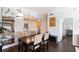 Elegant dining area with modern lighting, stylish furnishings, and open access to the kitchen, ideal for gatherings at 1101 Juniper Ne St # 721, Atlanta, GA 30309