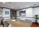Elegant dining room with a large table, a bookcase, a painting and comfortable seating at 1101 Juniper Ne St # 721, Atlanta, GA 30309
