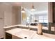 Chic kitchen featuring a farmhouse sink, stainless steel faucet, and stylish tile backsplash, perfect for culinary enthusiasts at 1101 Juniper Ne St # 721, Atlanta, GA 30309