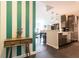 Stylish kitchen open to living area featuring stainless appliances and a large island at 1101 Juniper Ne St # 721, Atlanta, GA 30309