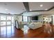 A comfortable lounge area featuring hardwood floors, stylish furniture and natural light at 1101 Juniper Ne St # 721, Atlanta, GA 30309