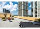 Rooftop terrace featuring outdoor seating and stunning skyline views for upscale living at 1101 Juniper Ne St # 721, Atlanta, GA 30309