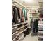 Organized walk-in closet featuring ample shelving, hanging space, and storage solutions for shoes, clothes, and accessories at 1101 Juniper Ne St # 721, Atlanta, GA 30309