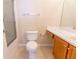 Well-lit bathroom featuring a shower, toilet, vanity, and ample storage space at 1830 Bayrose Cir # 30B, East Point, GA 30344