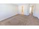 Spacious bedroom featuring neutral walls and carpets, with ensuite bathroom access at 1830 Bayrose Cir # 30B, East Point, GA 30344