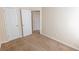Neutral bedroom with closet, carpet and a window to let in natural light at 1830 Bayrose Cir # 30B, East Point, GA 30344