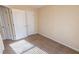 A cozy bedroom with neutral walls, carpet, and two closets at 1830 Bayrose Cir # 30B, East Point, GA 30344