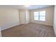 Inviting bedroom features a large window that provides ample natural light at 1830 Bayrose Cir # 30B, East Point, GA 30344