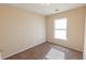 Cozy bedroom with carpet, neutral walls and a window at 1830 Bayrose Cir # 30B, East Point, GA 30344