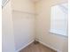 Walk-in closet with ample storage, shelving, and a window for natural light at 1830 Bayrose Cir # 30B, East Point, GA 30344