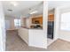 Open kitchen layout with dark appliances and ample cabinet storage at 1830 Bayrose Cir # 30B, East Point, GA 30344