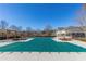 Community pool area fully covered during off-season with nearby seating for residents to enjoy at 1830 Bayrose Cir # 30B, East Point, GA 30344