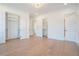 Spacious bedroom features hardwood floors and multiple closets for ample storage at 3825 Hall Rd, Dacula, GA 30019