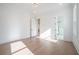 Bright, airy bedroom with hardwood floors and ensuite bathroom featuring modern design at 3825 Hall Rd, Dacula, GA 30019