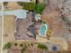 The aerial view shows the house on a large lot with a pool at 829 Waterford Estates Mnr, Canton, GA 30115