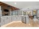 Modern kitchen with white cabinetry, stainless appliances, and center island at 829 Waterford Estates Mnr, Canton, GA 30115