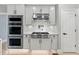 Well-equipped kitchen featuring stainless steel appliances and a modern design at 829 Waterford Estates Mnr, Canton, GA 30115