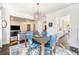 Stylish dining room with hardwood floors, modern chandelier, and open view to other rooms at 1239 E Rock Springs Ne Rd, Atlanta, GA 30306