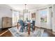 Elegant dining room with hardwood floors, chandelier, and ample natural light at 1239 E Rock Springs Ne Rd, Atlanta, GA 30306