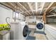 Laundry room featuring a modern washer and dryer set, providing convenience and efficiency at 1239 E Rock Springs Ne Rd, Atlanta, GA 30306