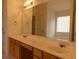 Bright bathroom with a double sink vanity, large mirror, and neutral color palette at 158 Weatherstone Dr, Woodstock, GA 30188