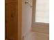 Bathroom showcasing a glass shower, soaking tub, towel rack, and window with blinds at 158 Weatherstone Dr, Woodstock, GA 30188