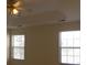 Bedroom with a ceiling fan and natural light from the windows at 158 Weatherstone Dr, Woodstock, GA 30188