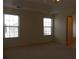 Bright bedroom with natural light and neutral-colored carpet at 158 Weatherstone Dr, Woodstock, GA 30188