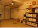 Garage featuring an automatic door and storage shelving at 158 Weatherstone Dr, Woodstock, GA 30188