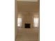 View of a bright living room featuring a fireplace and neutral carpet at 158 Weatherstone Dr, Woodstock, GA 30188