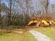 A neighborhood playground offers fun with swings, slides and more at 158 Weatherstone Dr, Woodstock, GA 30188