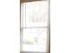 Window featuring white blinds at 158 Weatherstone Dr, Woodstock, GA 30188
